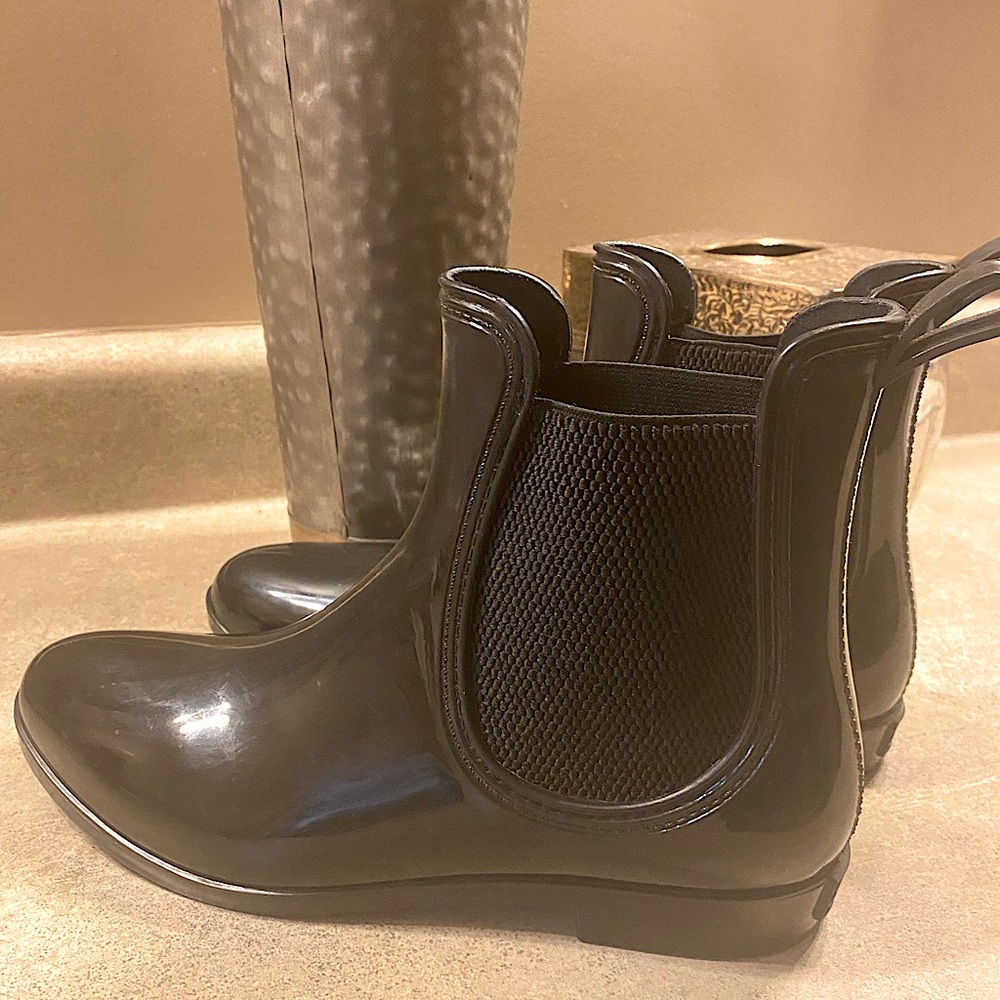 Seven brand black patent leather rain boots. May be worn as a regular bootie.